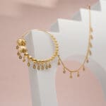 Elegant 18Kt Gold Flower Nath with Chain (NC18/30) Elegant 18Kt Gold Flower Nath with Chain (NC18/30)