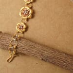 Minimal 22Kt Gold Three-Flower Chain Bracelet – Elegant Gift for Her CBL22/14 Minimal 22Kt Gold Three-Flower Chain Bracelet – Elegant Gift for Her CBL22/14