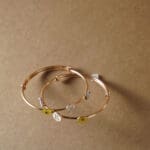 18KT Gold Adjustable Kada for Kids with Elephant, Crown & K Letter Charms KR18/89