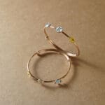 18KT Gold Adjustable Kada for Kids with Elephant, Crown & K Letter Charms KR18/89