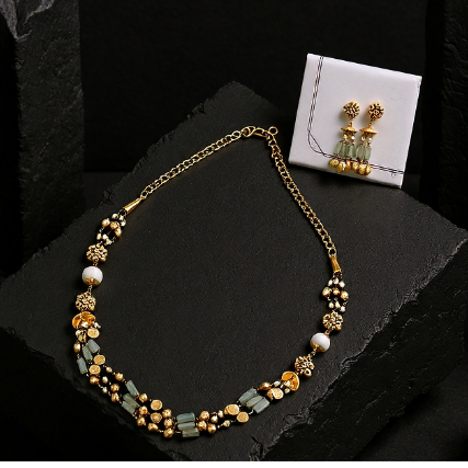 22Kt Gold Charm Necklace with Pink Stones and Matching Earrings ST22/1223 22Kt Gold Charm Necklace with Pink Stones and Matching Earrings ST22/1223