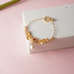 18Kt Gold Bridal Nath with Red & Clear Stones and Pearl Drop Loops NT18/177